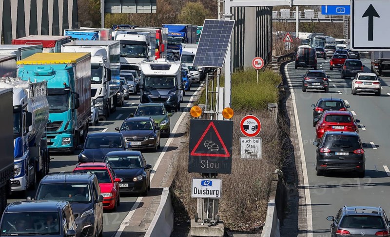 Oberhausen, North Rhine-Westphalia, Germany, traffic jam on the A3 motorway, Easter travel traffic, cars, vans, trucks, caravans and campers are stuck in the traffic jam