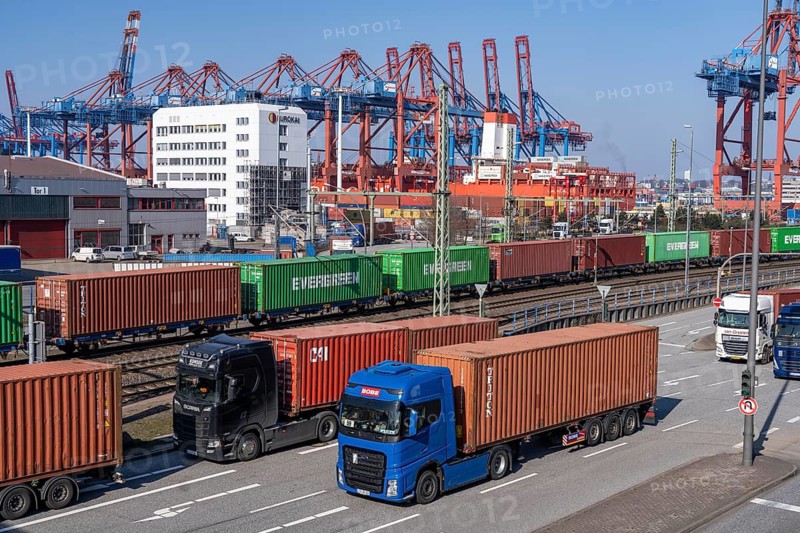 Port of Hamburg, Waltershofer Hafen, container ships, goods train with containers and container lorries bring and collect freight containers to and from HHLA Container Terminal Burchardkai, Hamburg, Germany