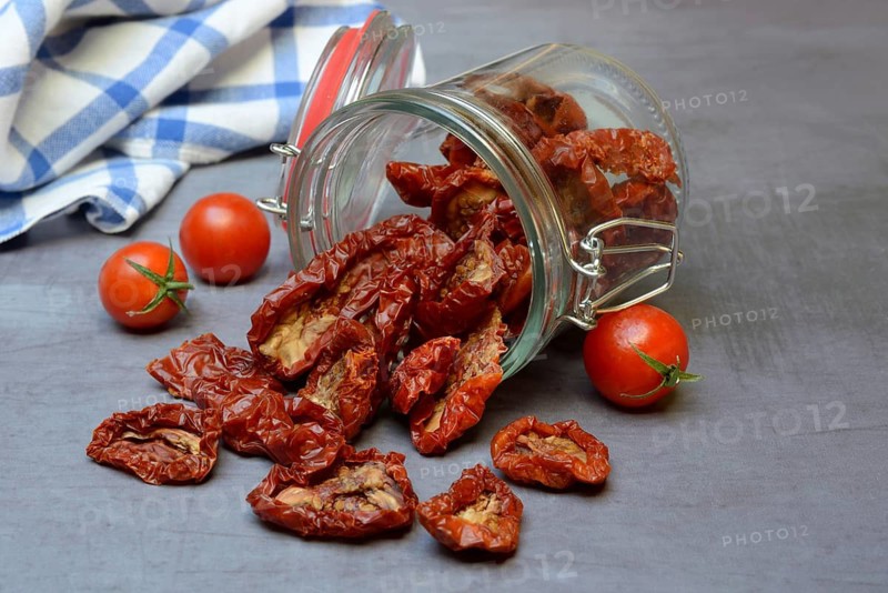 Dried tomatoes in glass containers, Solanum lycopersicum