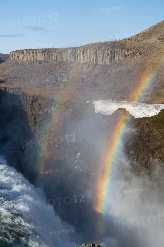 Gullfoss (Golden Falls is a waterfall located in the canyon of the Hvítá river in southwest Iceland. Rainbow over the waterfall