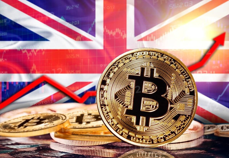 Bitcoin with United Kingdom flag in the background. Bitcoin rising with United Kingdom flag in the background