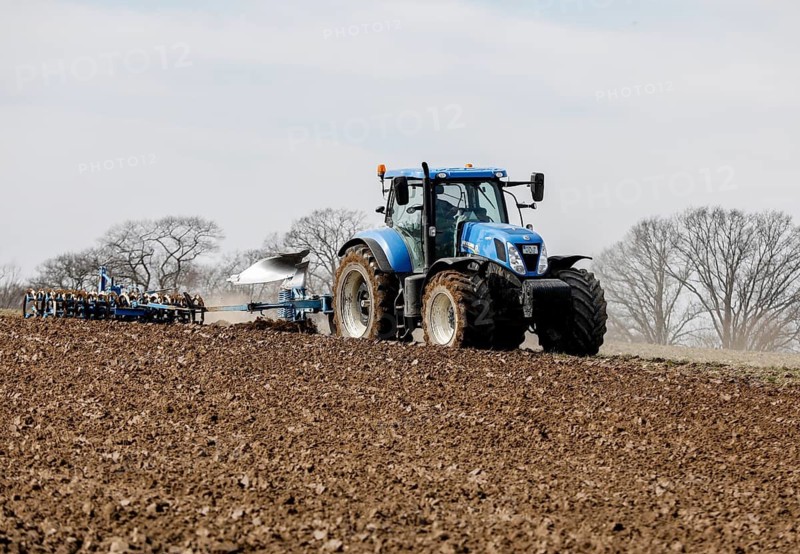 A tractor from the Jahnsfeld Biolandhof is pulling a seed furrow to sow gluten-free oats in the next few days. In addition to rye and wheat, oats and spelt are used as bread and baked grains on the organic farm's arable land, Müncheberg, Brandenburg, Germany