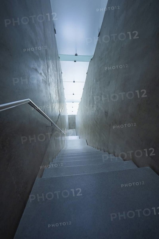 A cool, modernly designed concrete-look stairway, Kunsthaus Bregenz, Vorarlberg, Austria