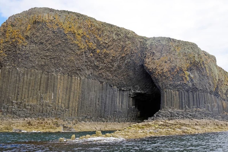 Imposing cave with basalt columns on the coast, creating a mystical atmosphere, Fingal's Cave, Staffa, Hebrides, Scotland, United Kingdom