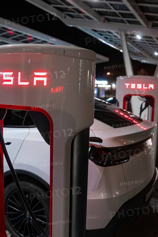 Tesla's rear view at a charging station at night, Tesla, Leonberg, Germany