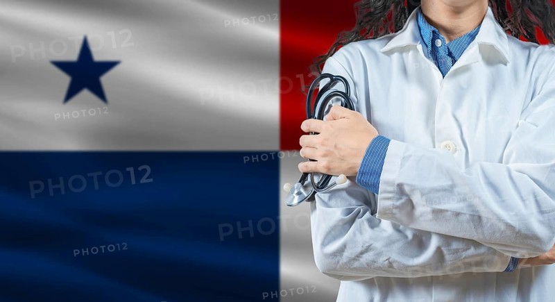 Healthcare professional with Panama flag background. Professional doctor holding stethoscope on Panama flag background