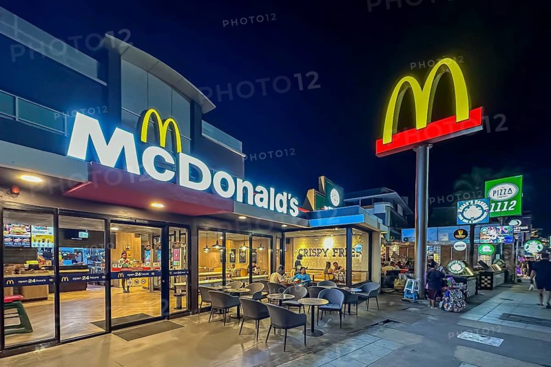 McDonald's fast food restaurant at night, exterior shot with logo. Patong, Kathu, Phuket Island, Thailand