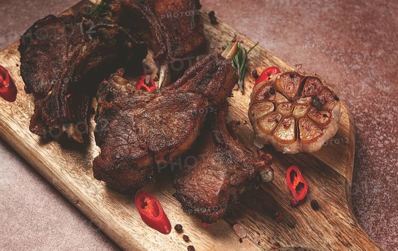 Fried veal ribs, with spices, baked in the oven, homemade, no people