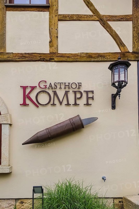 Gasthof Kompf, Swabian inn, restaurant, lettering, letters, facade, half-timbered house, tradition, replica of a Kompf, container for water to moisten the whetstone, outdoor light, lamp, Kusterdingen-Jettenburg, Baden-Württemberg, Germany