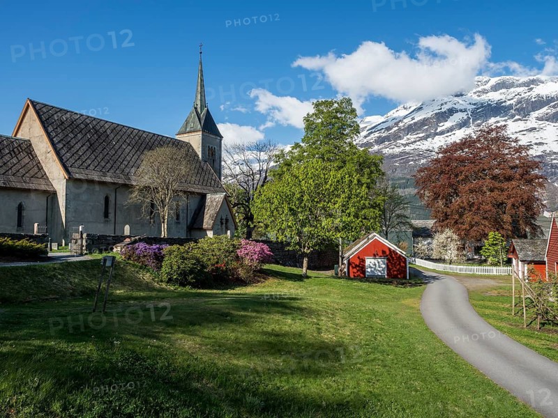 Church of Ullensvang near Lofthus, Hardangerfjord, springtime, snowy mountain, Norway