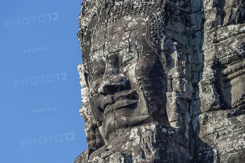Giant stone-carved face of the Bodhisattva Lokeshvara, also known as Avalokiteshvara, Bayon Temple, Angkor Thom, UNESCO World Heritage Site, Angkor Wat, Siem Reap, Cambodia