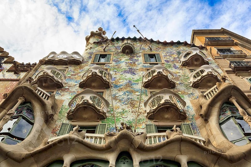 Artistically designed façade, balconies, Casa Batllo, view from below, Passeig de Gracia, Barcelona, Spain