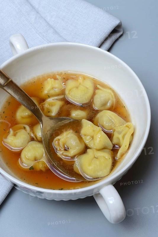 Cappelletti, pasta with broth in shell, pasta