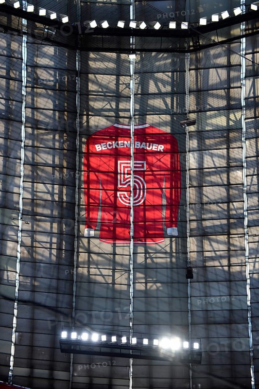 Larger-than-life jersey of Franz Beckenbauer with shirt number 5 hanging in the grandstand roof of the south curve, 125th anniversary of FC Bayern Munich FCB, Allianz Arena, Munich, Bavaria, Germany