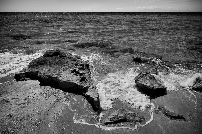 Rocks on the beach of Nea Kallikratia, Chalkidiki, Halkidiki, Macedonia, black and white, Greece