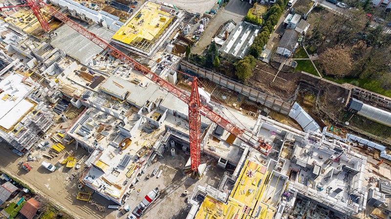 Böckinger Strasse neighbourhood construction site in Zuffenhausen. A total of around 460 new flats for various user groups are being built here. A project of the Internationale Bauausstellung StadtRegion Stuttgart 2027 (IBA'27) . Aerial view. Stuttgart, Baden-Württemberg, Germany