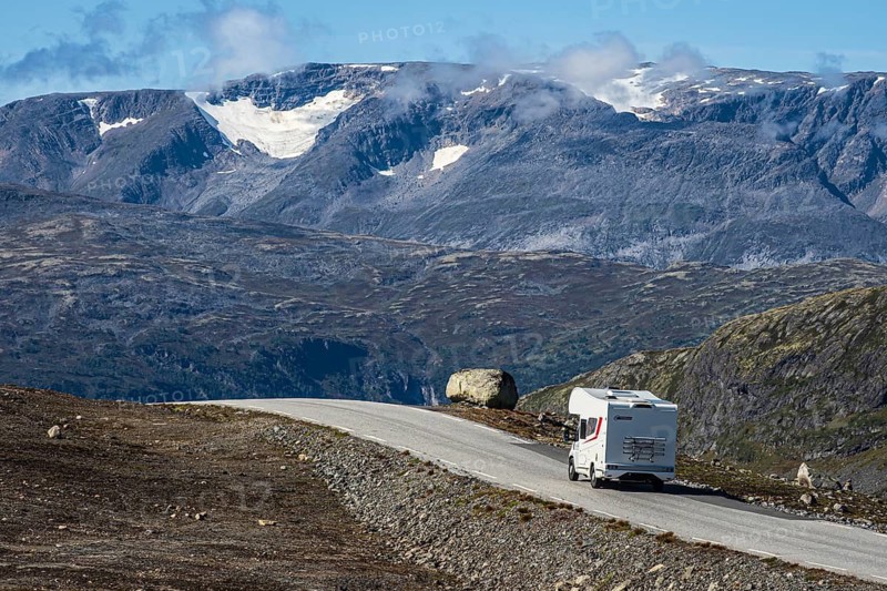 Camper van on mountain road Aurland - Lærdal, gamle Aurlandsvegen, National Tourist Route Aurlandsfjellet, Sognefjord, Norway