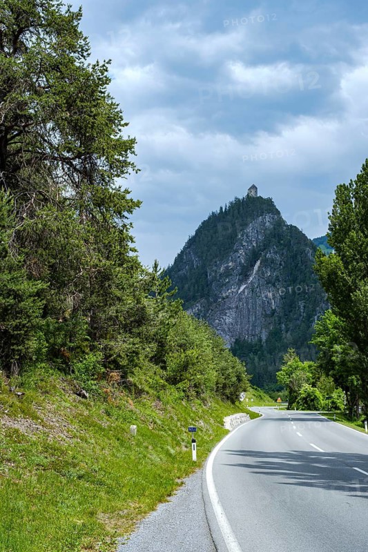 Alpine landscape on the Tyrolean road B 171 with a view of Kronburg Castle near Zams, Tyrol, Austria