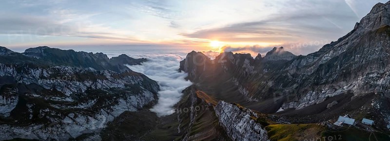 View over Säntis mountains into the valley of Meglisalp at sunrise, high fog in the valley, Säntis, Appenzell Ausserrhoden, Appenzell Alps, Switzerland