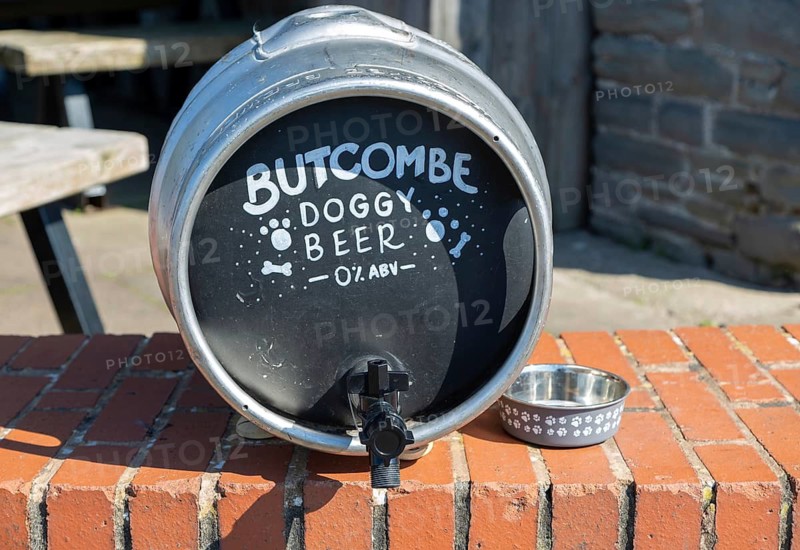 Pub steel barrel keg used to provide drinking water for dogs, Butcombe Doggy Beer, The Cottage Inn pub, Bristol, England, UK