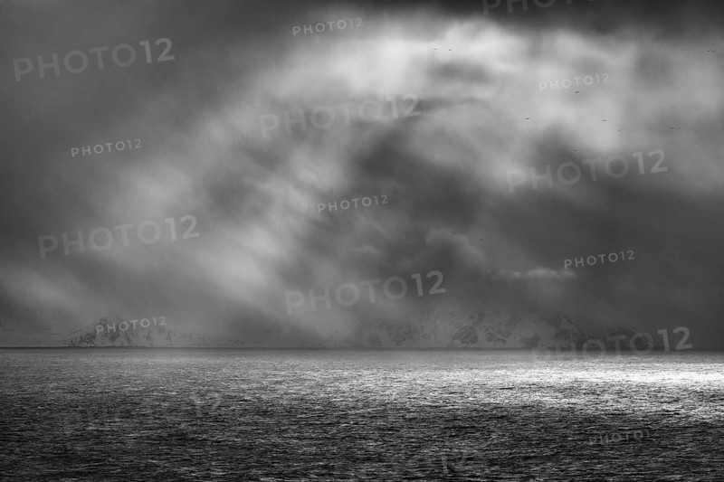 Dramatic lighting over the Norwegian European Sea, Söröya, Finnmark, Norway, March 2019
