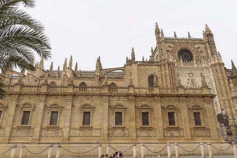 Gothic cathedral with impressive façade and towering towers, Seville, Andalucia, Spain