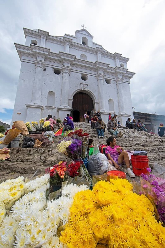 Flower market on the steps of Santo Tomás Church in Chichicastenango, Highlands, El Quiché Department, Guatemala