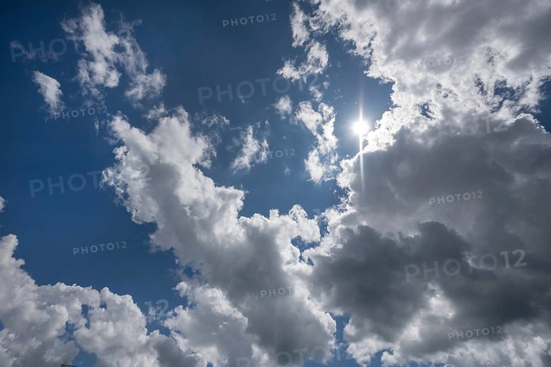 Fair weather clouds with sun against the light, Bavaria, Germany