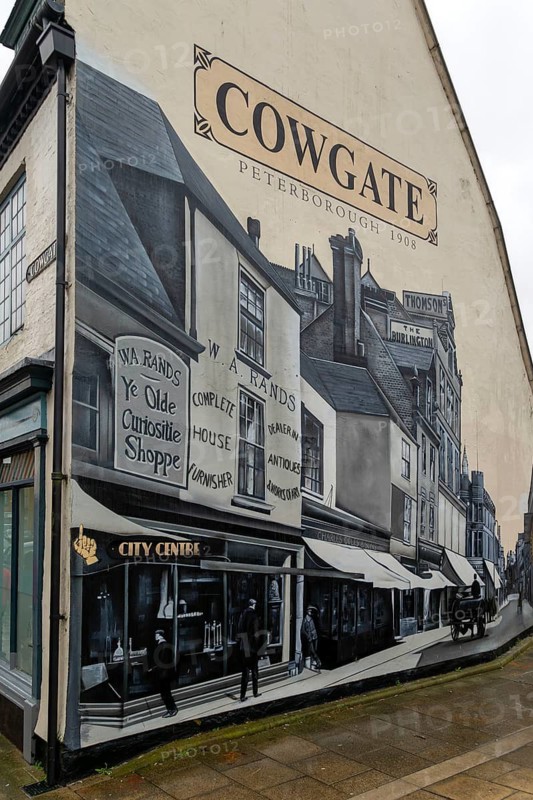 Cowgate mural of street in 1908 painted on end wall of building, Peterborough, Cambridgeshire, England, UK