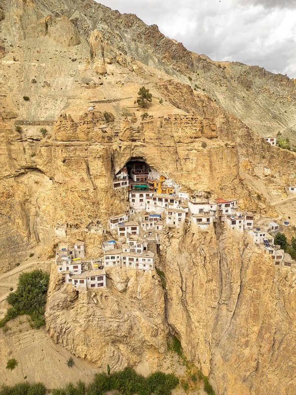 Discover Phugtal Monastery nestled in Ladakh's rugged cliffs. This remote Buddhist site, boasts stunning architecture and unique Himalayan landscape