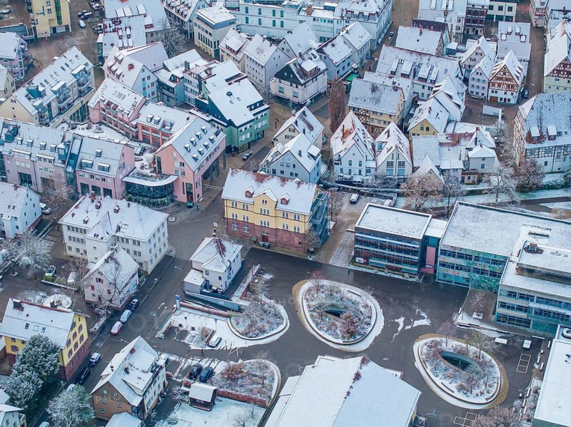 Bird's eye view of a snow-covered small town with interesting architecture, Nagold, Black Forest, Germany