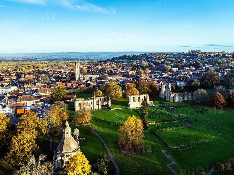 Sunrise over Glastonbury Abbey from a drone, Glastonbury, Somerset, England, United Kingdom