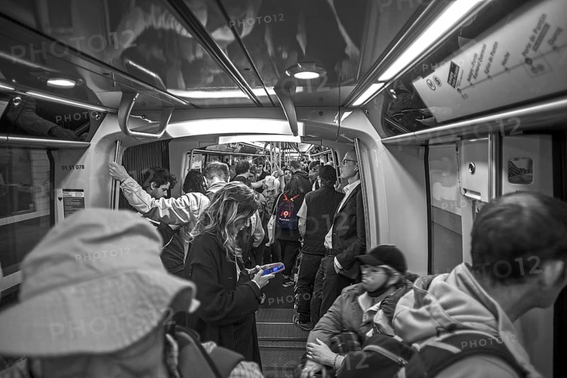 Metro fully staffed at rush hour, black and white, Paris France