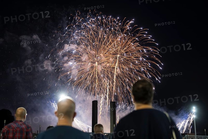 Spectators watch the fireworks at the Pyronale on the Maifeld at the Olympic Stadium, Berlin, 30/08/2024