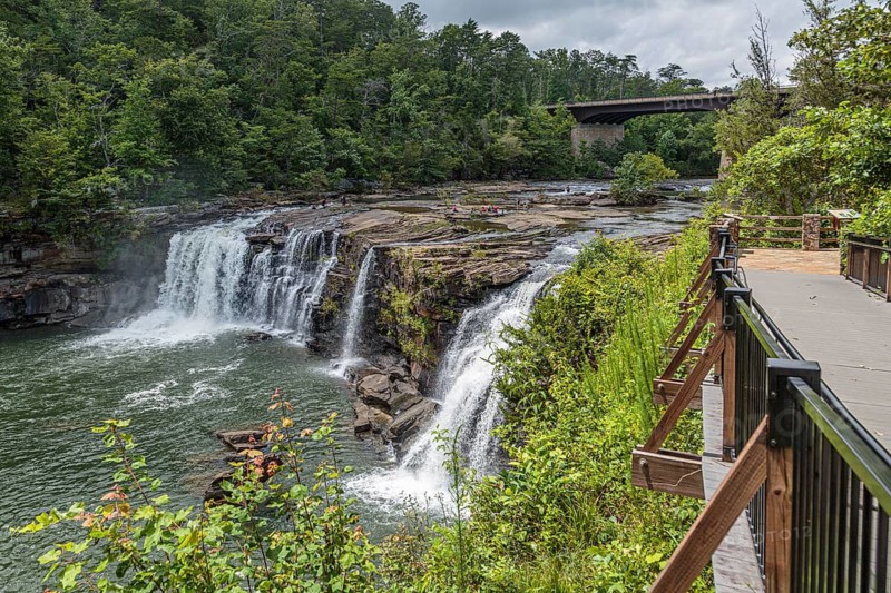 People playing on the rocks above the Little River Falls in Little River Canyon Falls Park near Ft. Payne, Alabama