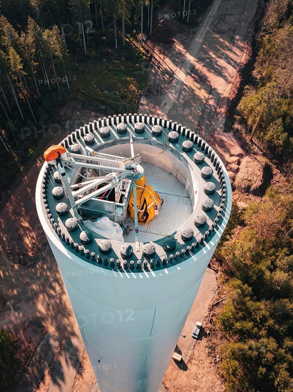 View of a wind turbine under construction in a dense forest area, Windrad Bau, Calmbach, Black Forest, Germany
