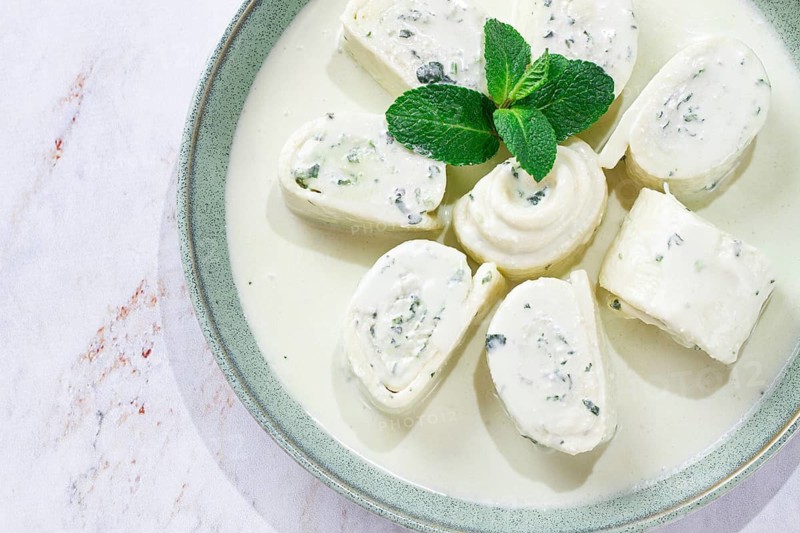 Gebjalia, Megrelian dish, cold appetizer of cheese with mint, Georgian traditional cuisine, homemade