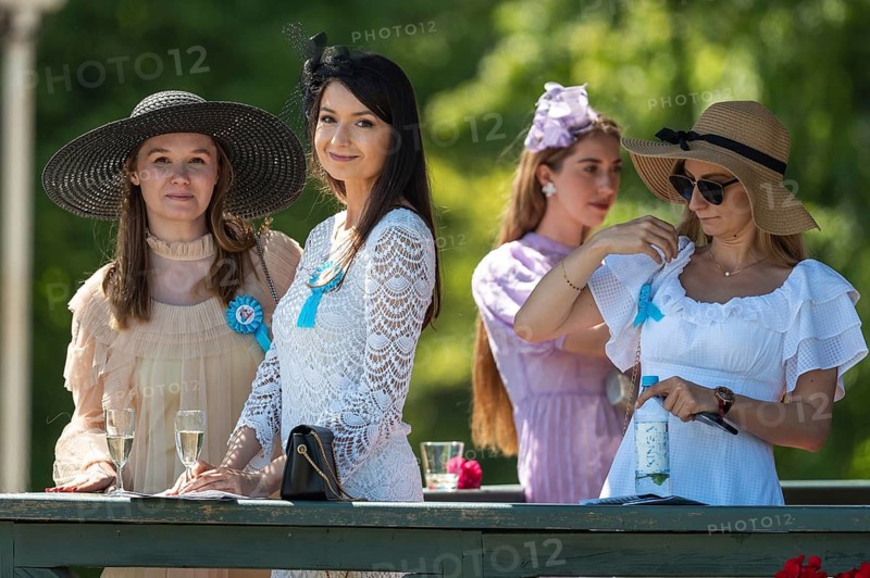 WROCLAW, POLAND - JUNE 4, 2023: Ladies Day at the racecourse WTWK Partynice. Women on the VIP tribune.