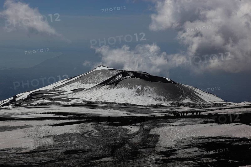Volcanic landscape at the secondary crater of Etna, Etna with snow, Sicily, Italy