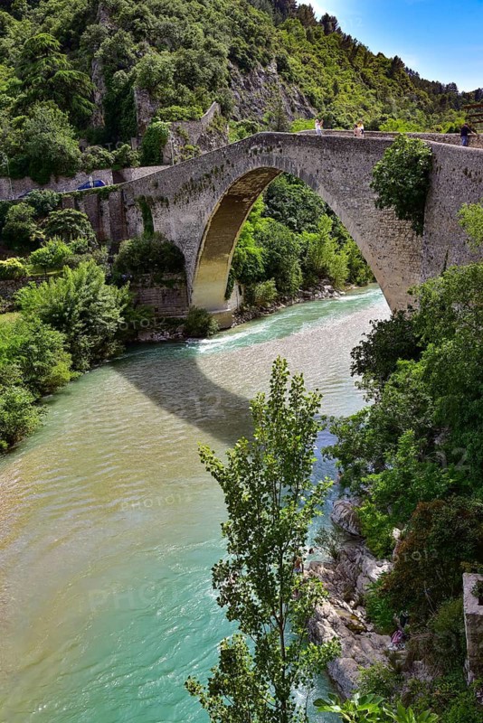 The Pont de Nyons, medieval stone arch bridge over the river Eygues in the municipality of Nyons in the Auvergne-Rhône-Alpes region in the south of France