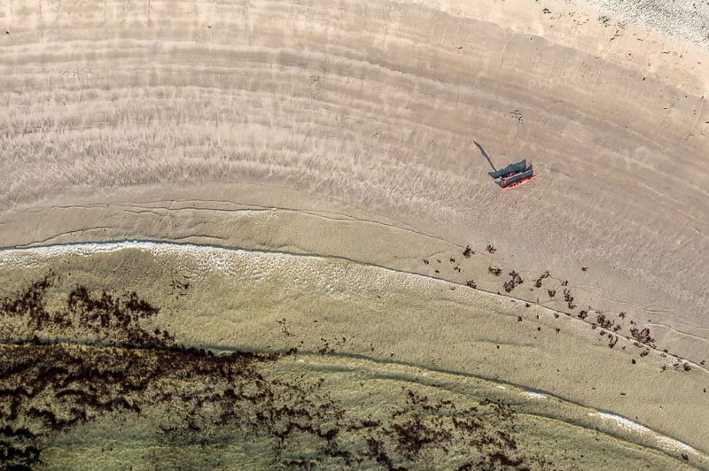 Aerial view of a kayak at beach Ersfjordstranden, fjord Ersfjord, northern Norway, Norway
