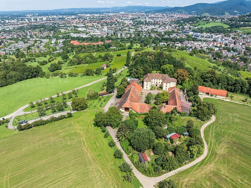 Aerial view of castle Jesuitenschloss Merzhause and city Freiburg, Germany