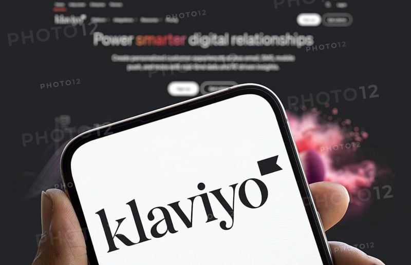 klaviyo logo is displayed on smartphone. Klaviyo Inc is a global technology company that provides a marketing automation platform