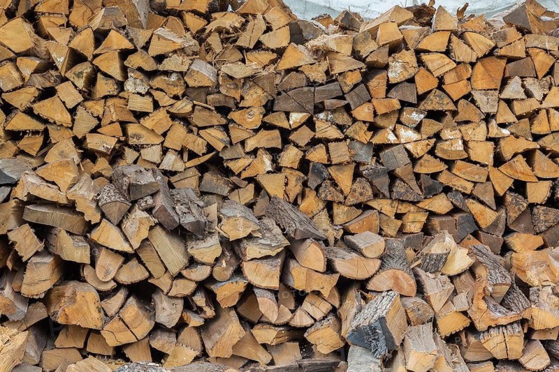 Large pile of cut and stacked firewood, Quebec, Canada