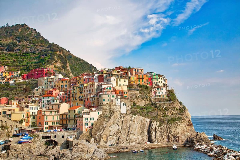 Italy, Manarola colorful streets overlooking scenic shoreline