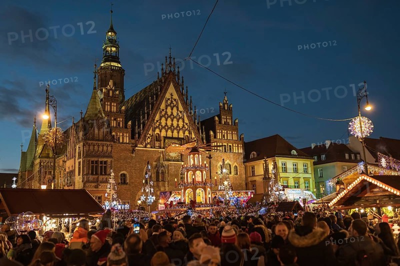 WROCLAW, POLAND - DECEMBER 08, 2018: Christmas fair in the market square of Wroclaw with the city hall