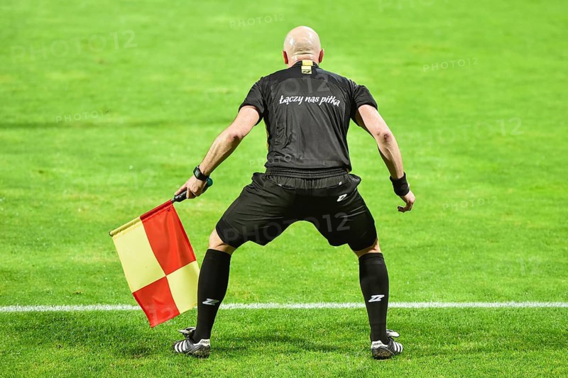 LEGNICA, POLAND - JUNE 2, 2020: Match Polish football Fortuna 1. League between Miedz Legnica vs PGE FKS Stal Mielec 1:2. In action touch line referee.