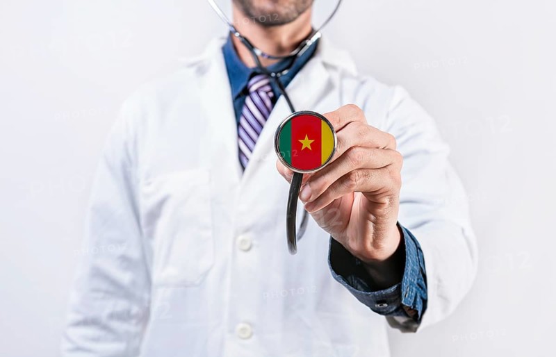 Cameroon healthcare system, doctor holding stethoscope. Cameroon health and medical insurance concept