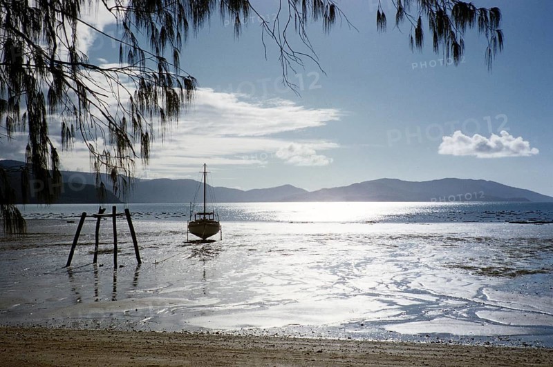 Melbourne Grammar School expedition to Queensland, Australia, 1956: yacht silhouette on the beach, thought to be the Whitsunday Islands