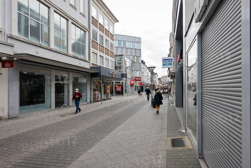 Krefeld, North Rhine-Westphalia, Germany - Krefeld city centre in times of the corona crisis during the second lockdown, most shops are closed, some shops are empty, only a few passers-by are walking on Hochstraße, the main shopping street